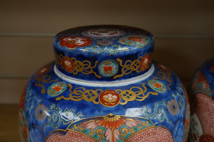 A pair of Japanese Fukagawa Imari vases and covers, with internal covers, one cover, koransha mark, 25cm